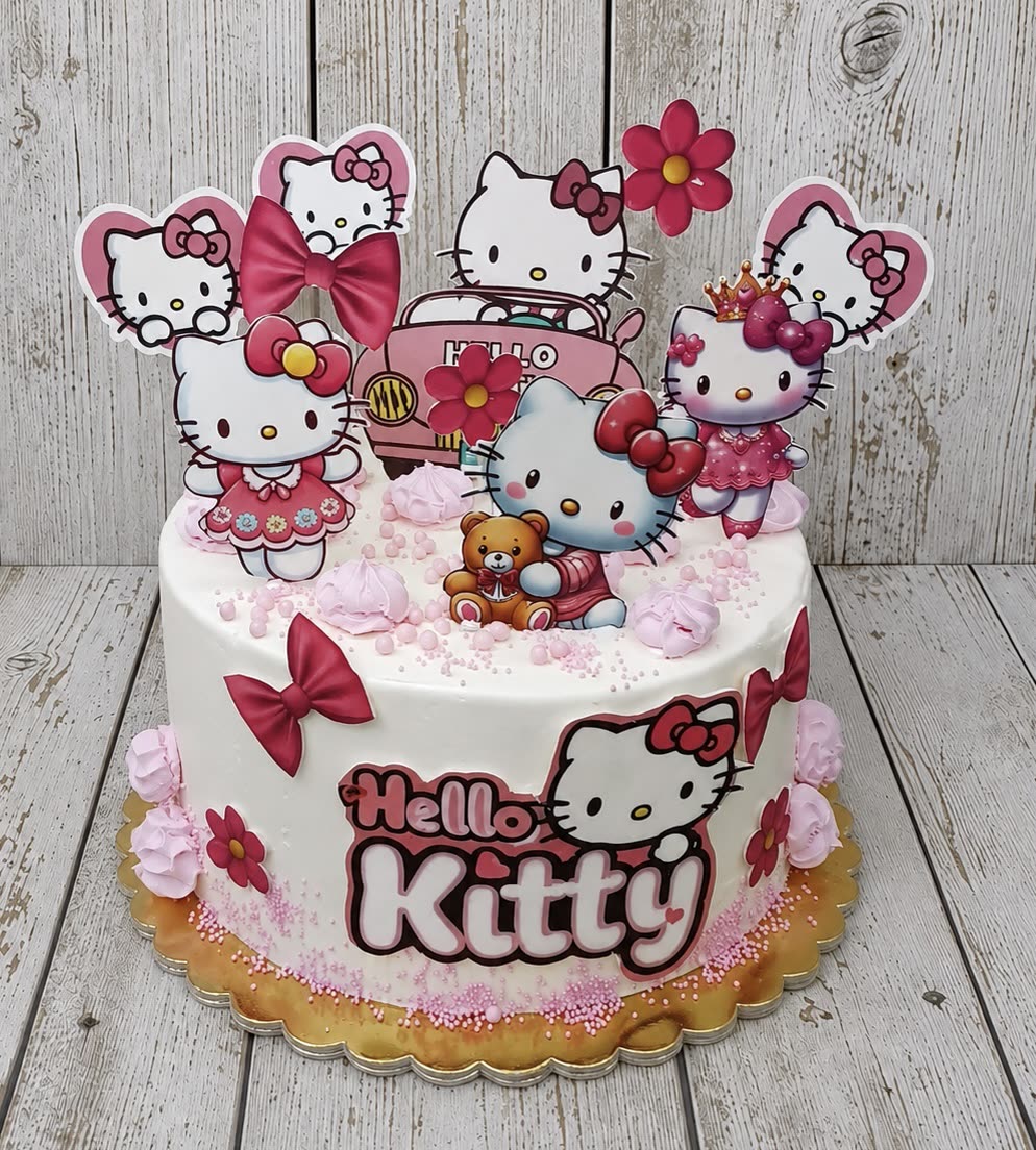 Fehér-rózsaszín Hello Kitty torta cukorlap figurákkal