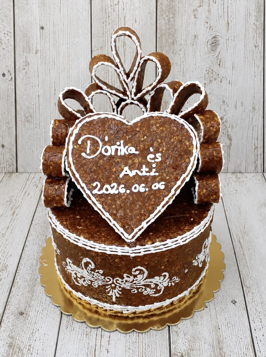 Grillázs esküvői torta sodort grillázs masnival, írókázott szívvel és dátummal