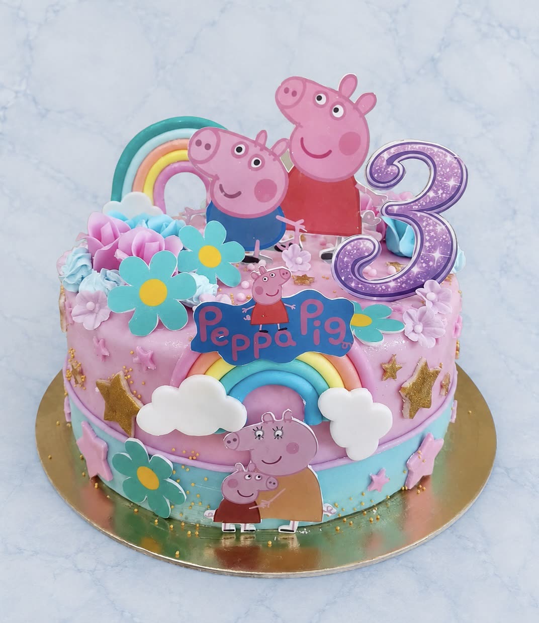 Rózsaszín Peppa malac torta szivárvánnyal és virágokkal